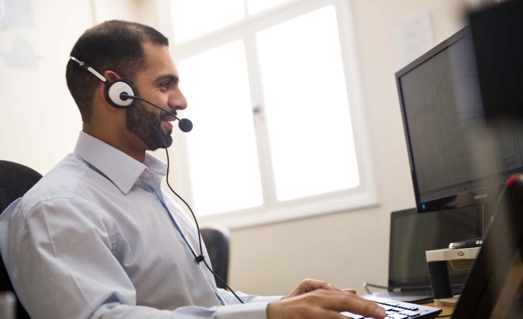 Call centre agent using Noetica's outbound dialler technology for high performance outbound dialling